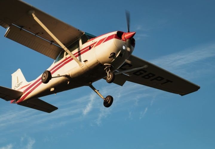 Small plane flying with onboard radio communication
